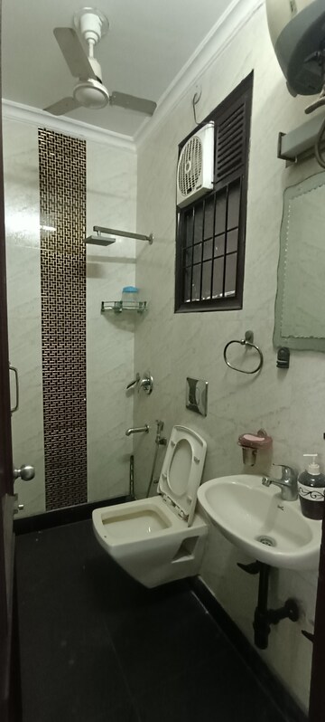Bathroom in 3.5 BHK Builder Floor at Kalkaji – for Rent