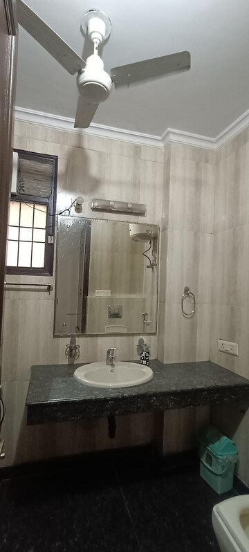 Bathroom in 3.5 BHK Builder Floor at Kalkaji – for Rent