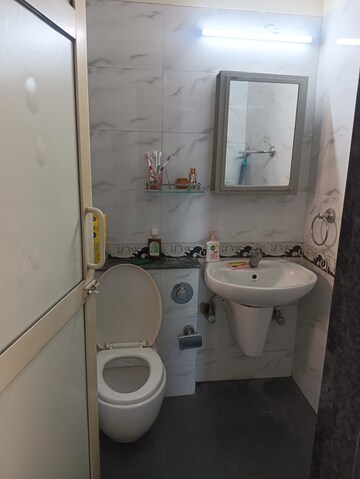 Bathroom in 1 BHK Apartment at K Raheja Raheja Residency, Malad East – for Rent