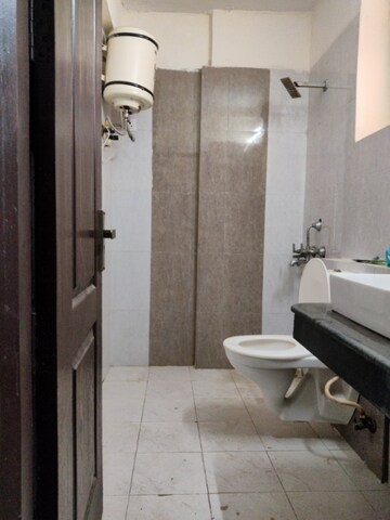Bathroom in 2.5 BHK Apartment at Sikka Karmic Greens, Sector 78 – for Rent