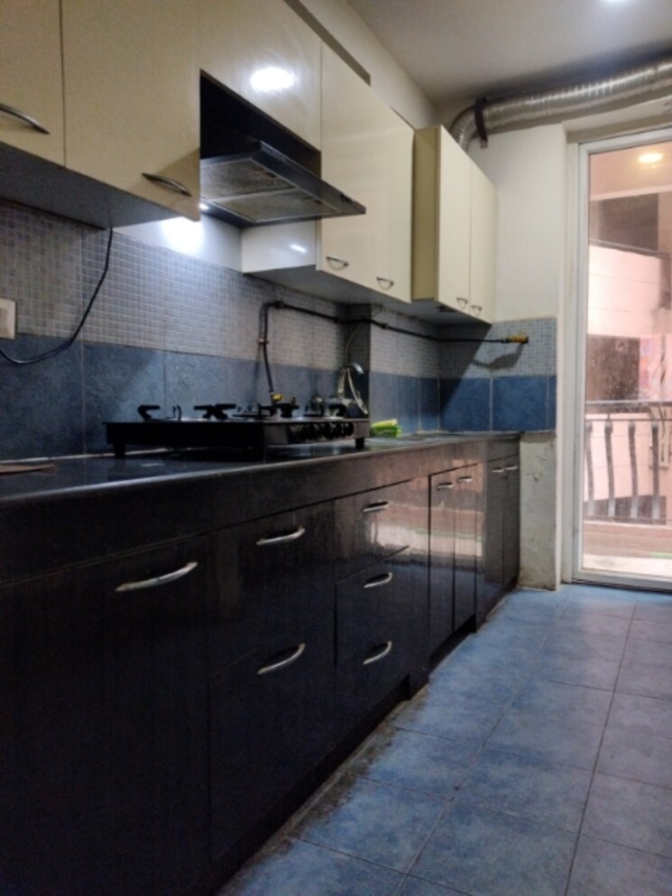 Kitchen, sikka-karmic-greens 2.5 Bedroom 1210 Sq.Ft. Apartment In Sector 78 Noida 8750573