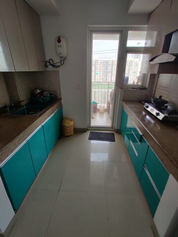 Kitchen in 3 BHK Apartment at Emaar Gurgaon Greens, Sector 102 – for Rent