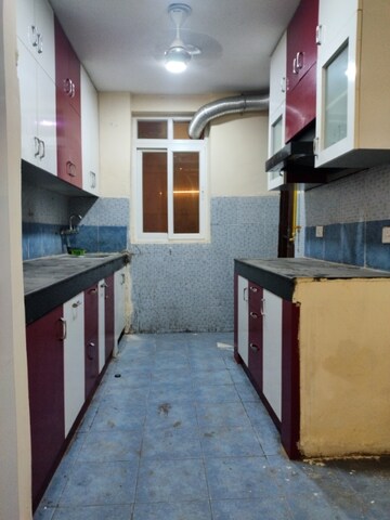 Kitchen in 3.5 BHK Apartment at Sikka Karmic Greens, Sector 78 – for Rent