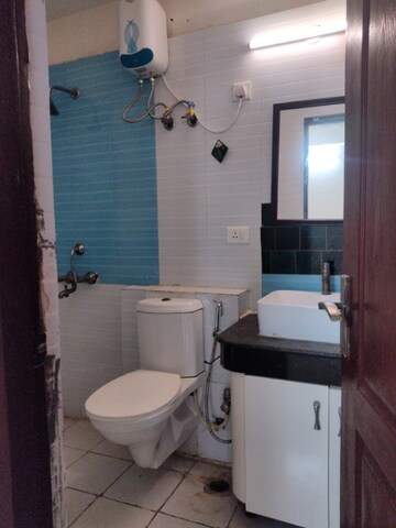 Bathroom in 3.5 BHK Apartment at Sikka Karmic Greens, Sector 78 – for Rent