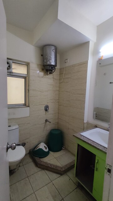 Bathroom in 3 BHK Apartment at Moti Nagar – for Sale