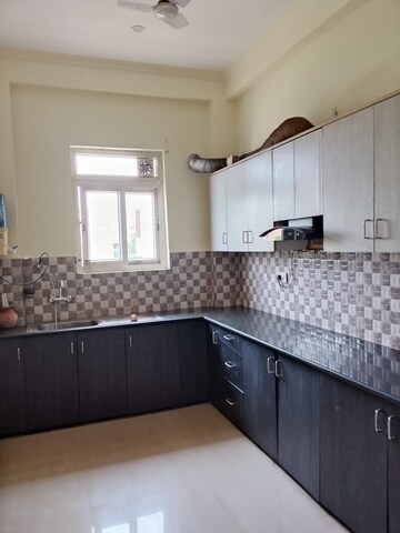 Kitchen in 3 BHK Builder Floor at Ansal API Esencia, Sector 67 – for Sale