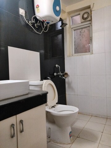 Bathroom in 3.5 BHK Apartment at Sikka Karmic Greens, Sector 78 – for Rent
