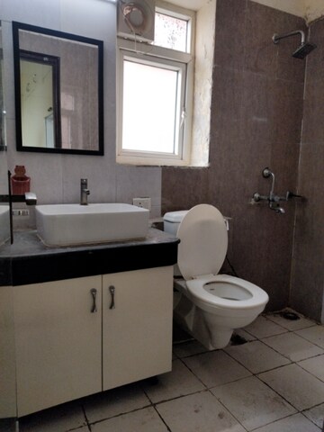 Bathroom in 3.5 BHK Apartment at Sikka Karmic Greens, Sector 78 – for Rent