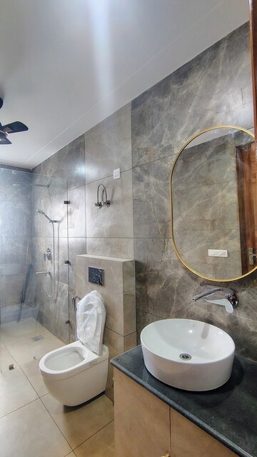 Bathroom in 3 BHK Builder Floor at Hong Kong Bazaar, Sector 57 – for Rent