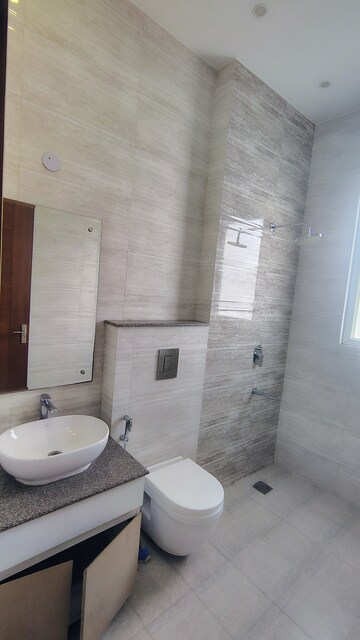 Bathroom in 3 BHK Builder Floor at Hong Kong Bazaar, Sector 57 – for Rent