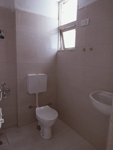 Bathroom in 2 BHK Apartment at Adore Happy Homes Grand, Sector 85 – for Sale
