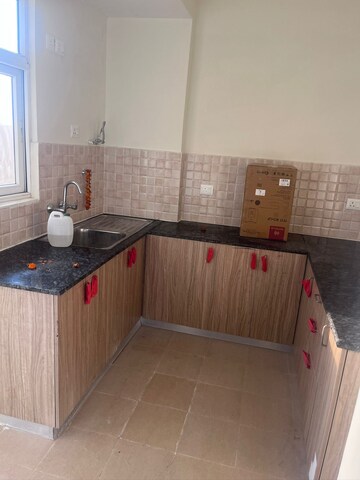 Kitchen in 3 BHK Apartment at Amrapali Crystal Homes, Sector 76 – for Rent