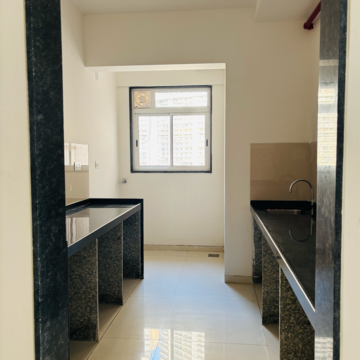Kitchen in 3 BHK Apartment at Runwal Nirvana, Dhabholkar Wadi – for Rent
