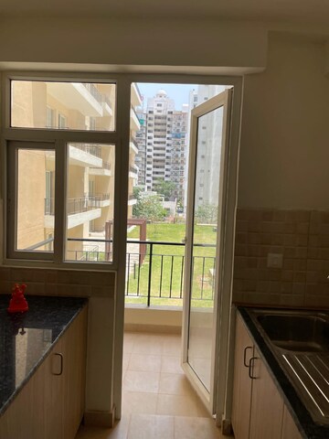 Kitchen in 3 BHK Apartment at Amrapali Crystal Homes, Sector 76 – for Rent