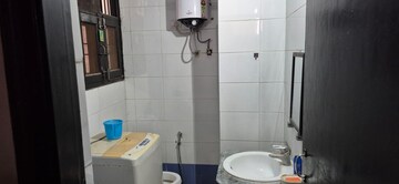 Bathroom in 2 BHK Builder Floor at Guru Nanak Enclave, Dhakoli – for Rent