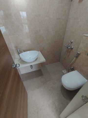 Bathroom in 1 BHK Apartment at JP Eminence, Andheri West – for Rent