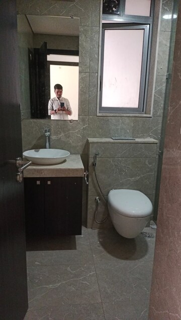Bathroom in 4 BHK Apartment at Oberoi Sky City, Borivali East – for Rent