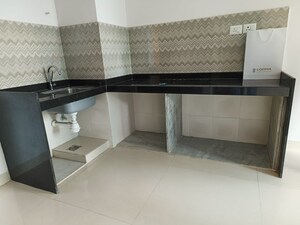 Kitchen in 1 BHK Apartment at JS Bal Ganesh Tower, Naupada – for Sale