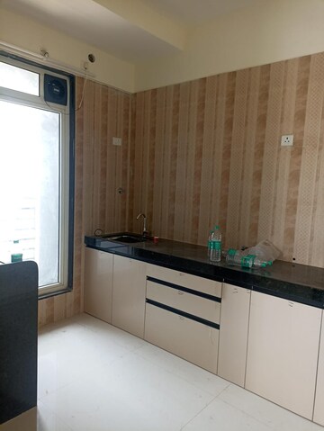 Kitchen in 2 BHK Apartment at Sheth Zuri, Laxmi Nagar – for Rent