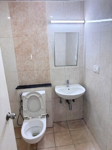 Bathroom in 3 BHK Apartment at Mantri Manyata Lithos, Thanisandra – for Rent