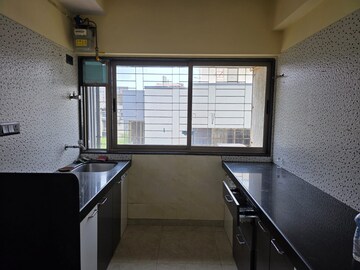 Kitchen in 2 BHK Apartment at Vile Parle East – for Rent