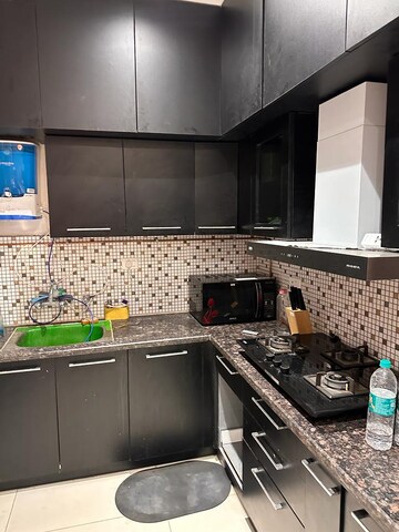 Kitchen in 3 BHK Apartment at Saya Gold Avenue, Vaibhav Khand – for Rent