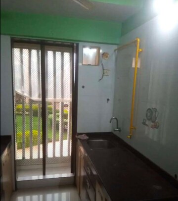 Kitchen in 1 BHK Apartment at Parikh Paradise Tower, Virar West – for Rent