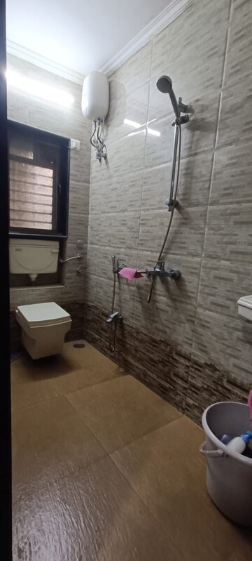 Bathroom in 2 BHK Apartment at Golden Square, Santacruz East – for Rent