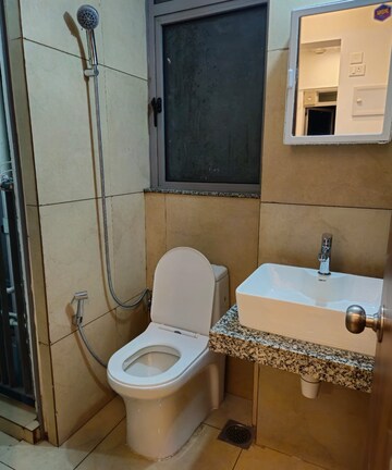 Bathroom in 1 BHK Apartment at Kalpataru Immensa, Kolshet Road – for Rent