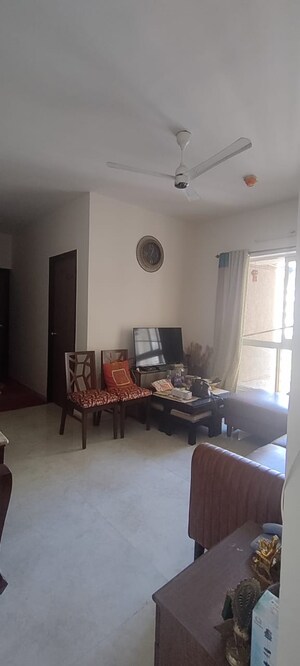 Living Room in 2 BHK Apartment at Lodha Amara, Kolshet Road – for Sale