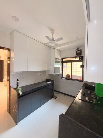 Kitchen in 2.5 BHK Apartment at Piramal Vaikunth, Balkum Pada – for Rent