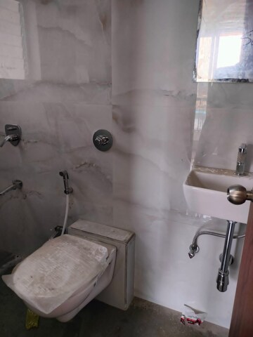 Bathroom in 1 BHK Apartment at Ekdant Anmol Oasis, Naupada – for Rent