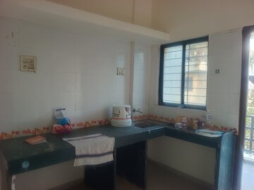 Kitchen in 2 BHK Apartment at Basil Pawan Dham Residency, Chakan – for Rent