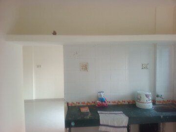 Kitchen in 2 BHK Apartment at Basil Pawan Dham Residency, Chakan – for Rent