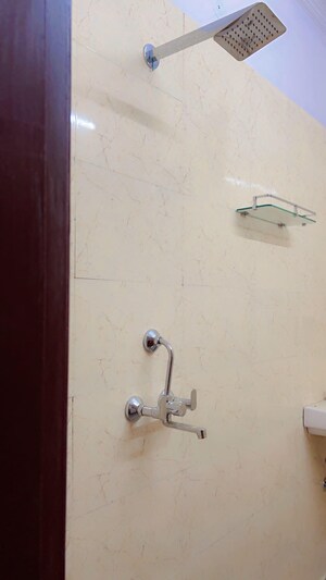 Bathroom in 4 BHK Apartment at Tilak Nagar – for Sale