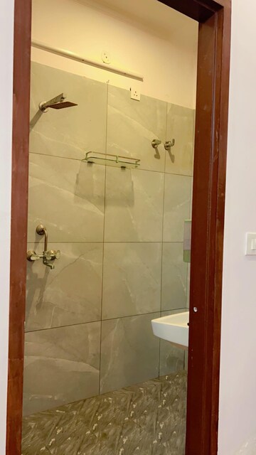 Bathroom in 4 BHK Apartment at Tilak Nagar – for Sale