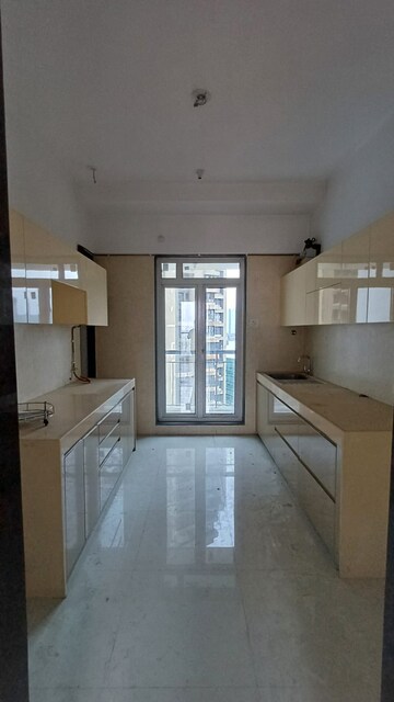 Kitchen in 2.5 BHK Apartment at Sheth Avalon Phase 2, Majiwada – for Rent
