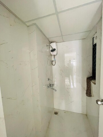 Bathroom in 1 BHK Apartment at Runwal Gardens Phase I, Dombivli East – for Rent