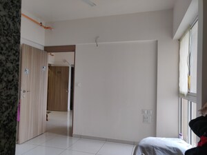 Room in 1 BHK Apartment at Godrej Nirvaan, Themghar – for Sale