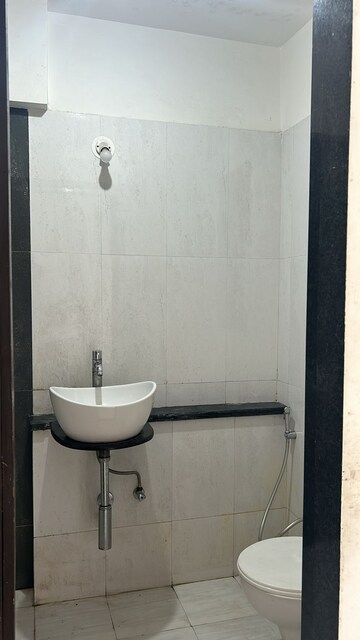 Bathroom in 2 BHK Apartment at Vile Parle East – for Sale