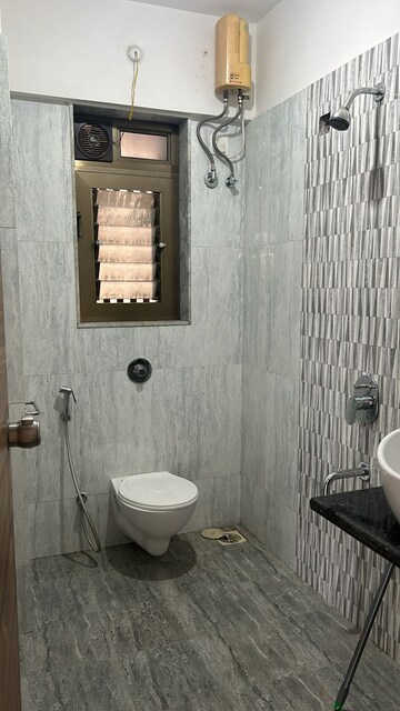 Bathroom in 2 BHK Apartment at Vile Parle East – for Sale
