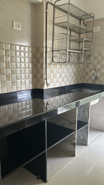 Kitchen in 2 BHK Apartment at Vile Parle East – for Sale