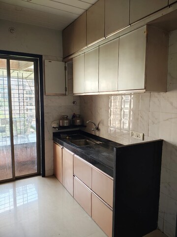 Kitchen in 3 BHK Apartment at Ratan Riviera, Tawri Pada – for Rent