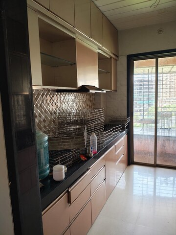 Kitchen in 3 BHK Apartment at Ratan Riviera, Tawri Pada – for Rent