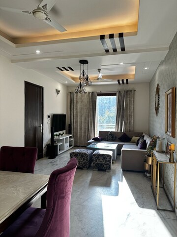 Living Room in 4 BHK Apartment at Emaar The Palm Drive-Palm Studios, Sector 66 – for Sale