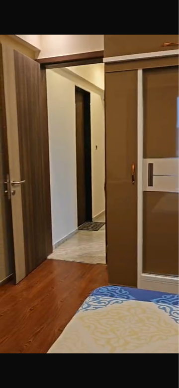 Bedroom in 2 BHK Apartment at Mohan Altezza, Wayle Nagar – for Rent