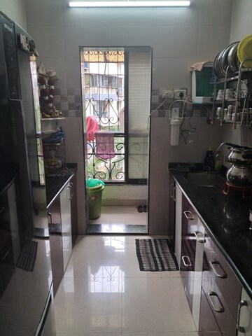 Kitchen in 1 BHK Apartment at Wadhwa Shiv Leela Apartment, Tawri Pada – for Sale