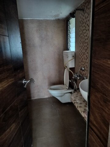 Bathroom in 1 BHK Apartment at Pravitha CHS, Dombivli West – for Rent