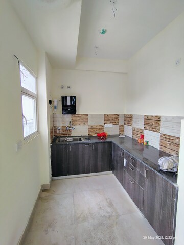 Kitchen in 2.5 BHK Apartment at Tech Zone 4 Greater Noida – for Rent