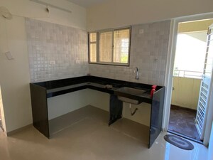 Kitchen in 2 BHK Apartment at Vighnaharta Sai Saroj, Ravet – for Sale